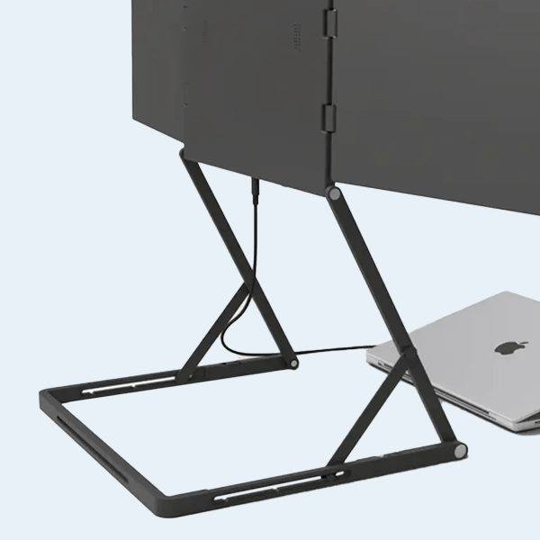 Detail view of the Doxa Pro 3’s aluminium stand supporting the extended triple-screen layout with a laptop underneath.