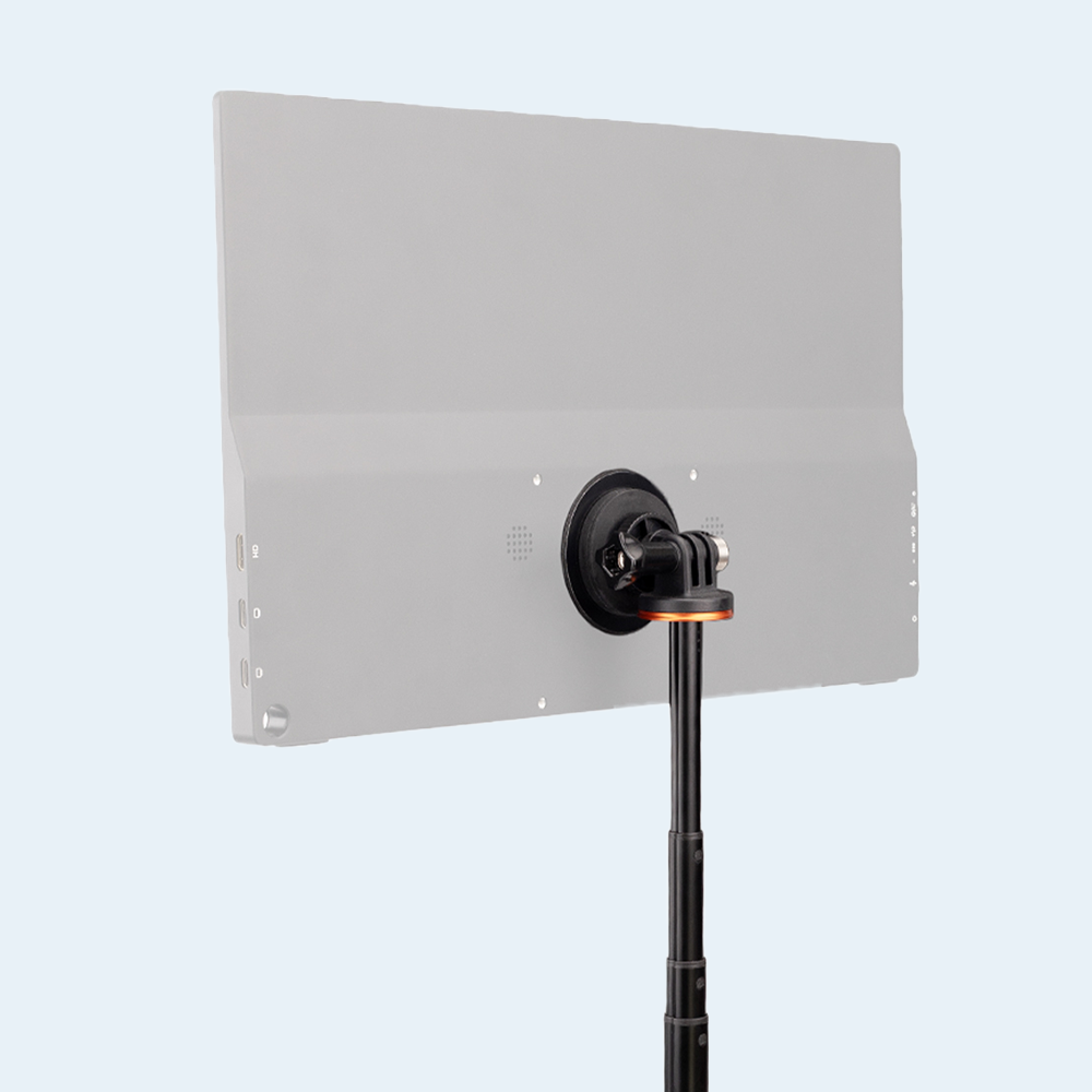X-Stand portable monitor stand with magnetic attachment design