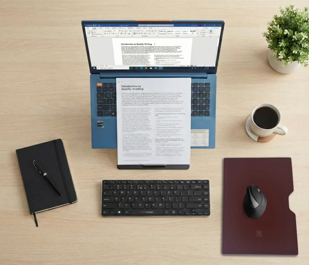 Oryx evo D Black limited-edition laptop stand with documents positioned clearly below the laptop screen